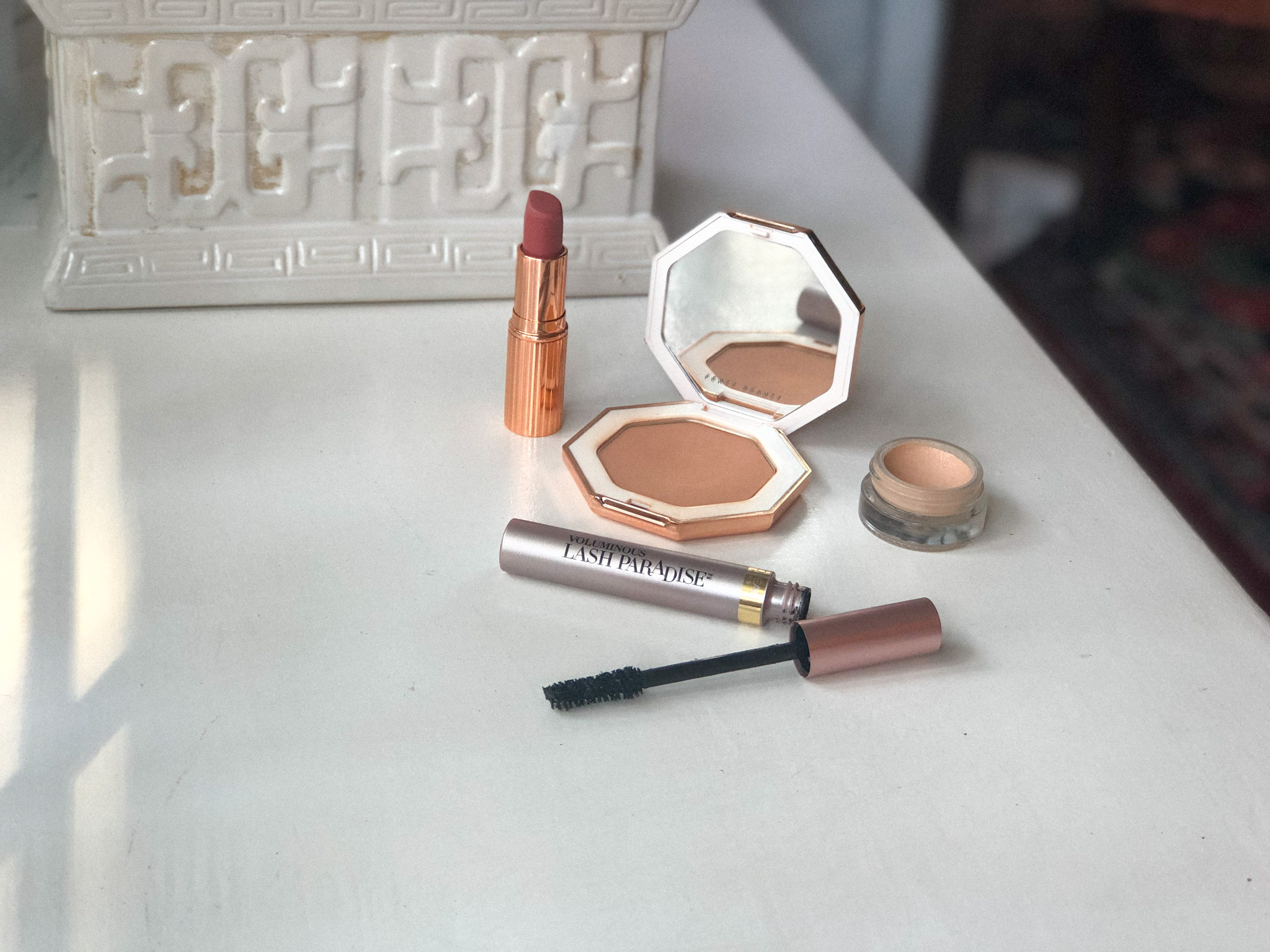 L'Oreal Lash Paradise Mascara, posed with other beauty products