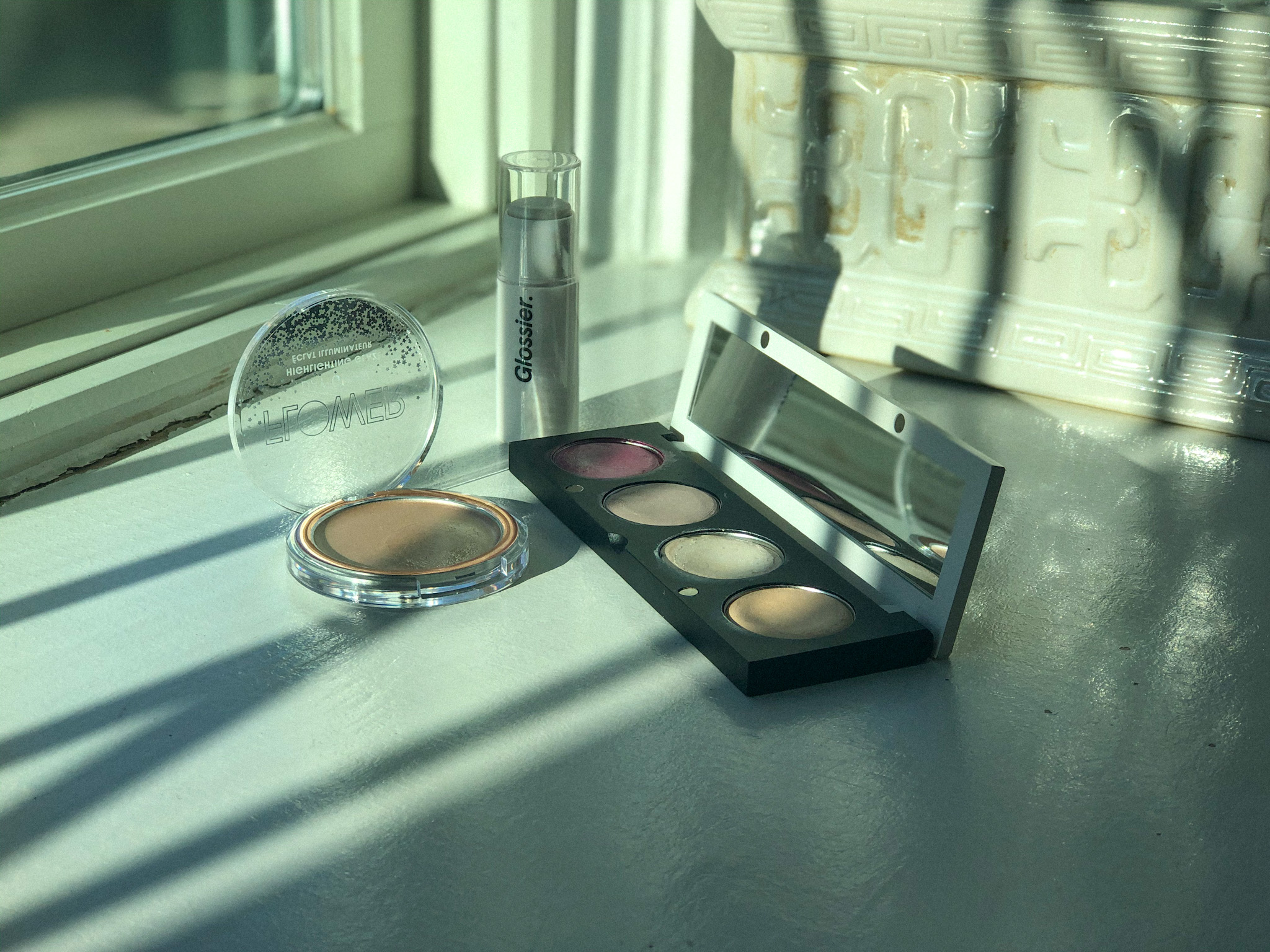 My glossy highlighter edit featuring Glossier Haloscope, Flower Beauty Day Glow Highlighting Glaze, & The Organic Skin Co In The Spotlight Luminizer