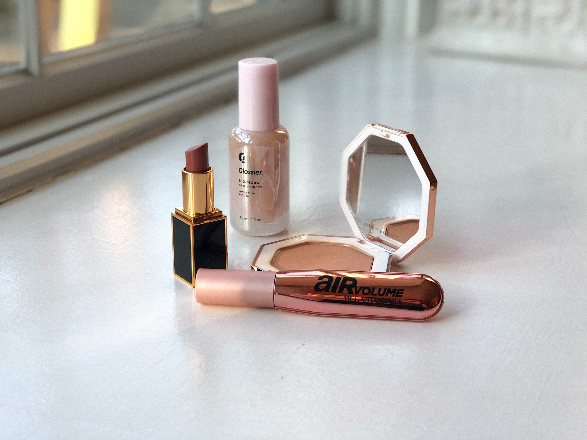 L'Oreal Air Volume Mascara, posed with other beauty products