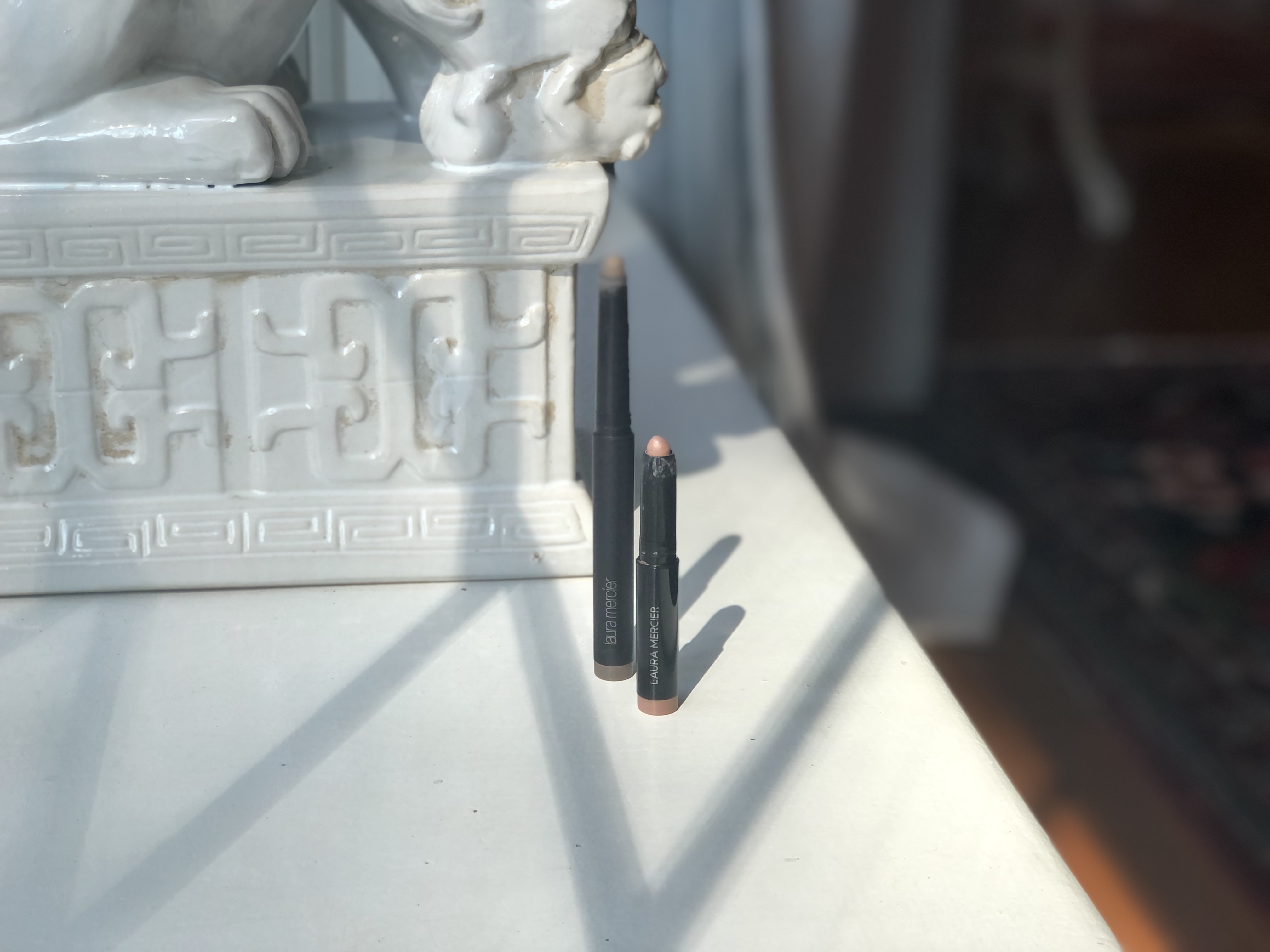 The Laura Mercier Caviar Sticks in the shades Cobblestone (left), and Au Naturel (right)