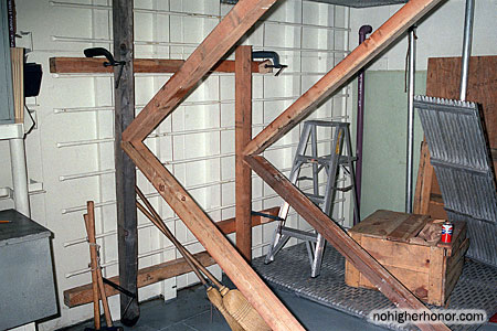 Despite the mortal danger, members of the crew assembled textbook-quality shoring in the main storeroom to brace a weakened bulkhead that backed up to a flooded AMR3 aboard the guided missile frigate USS SAMUEL B. ROBERTS (FFG-58), which struck an Iranian mine while in the Persian Gulf on April 14, 1988.