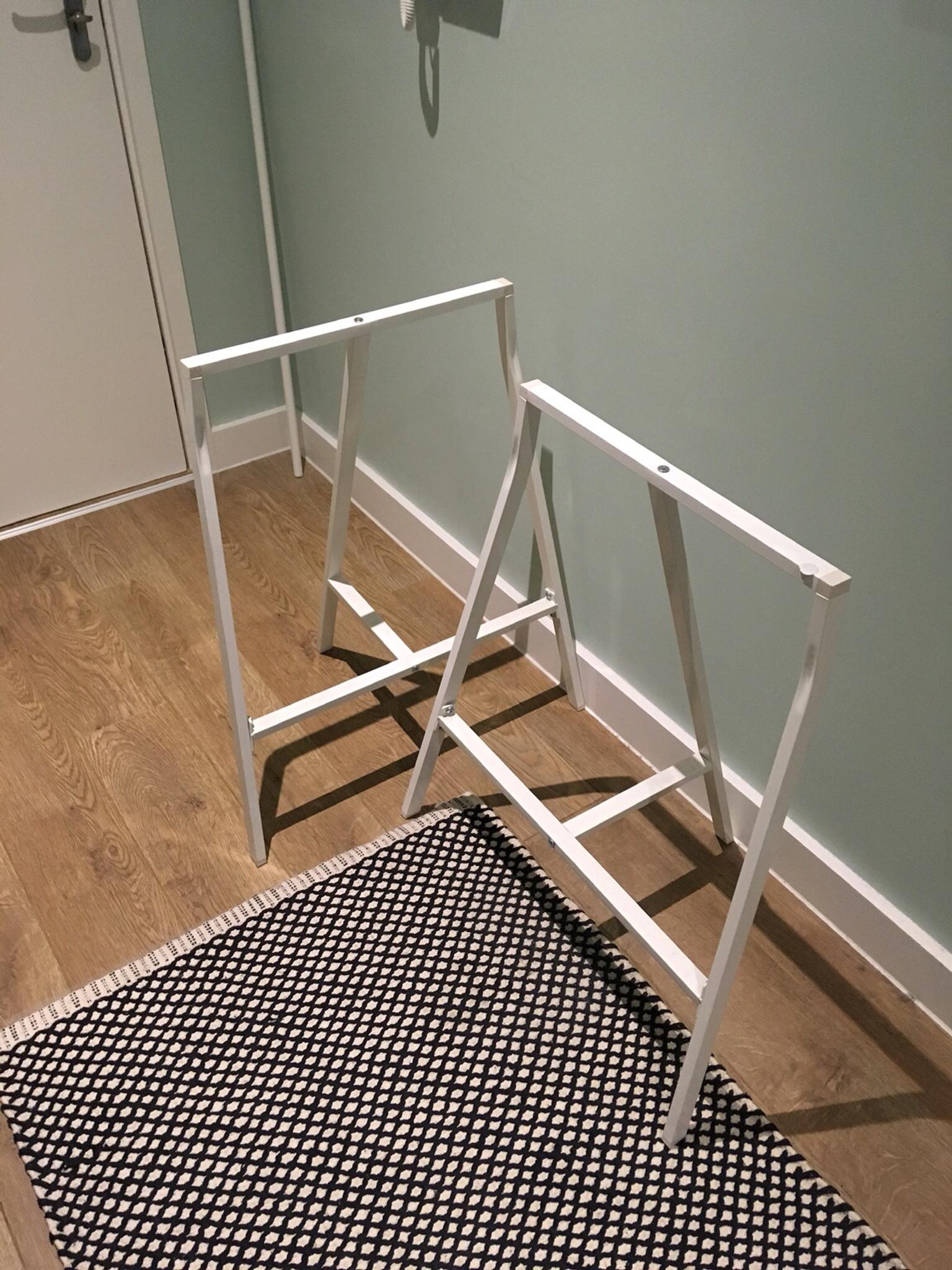 This kit includes optional attachment hardware to attach two ikea lerberg trestle legs to any tabletop. Two white IKEA trestle table legs in E3 London for free