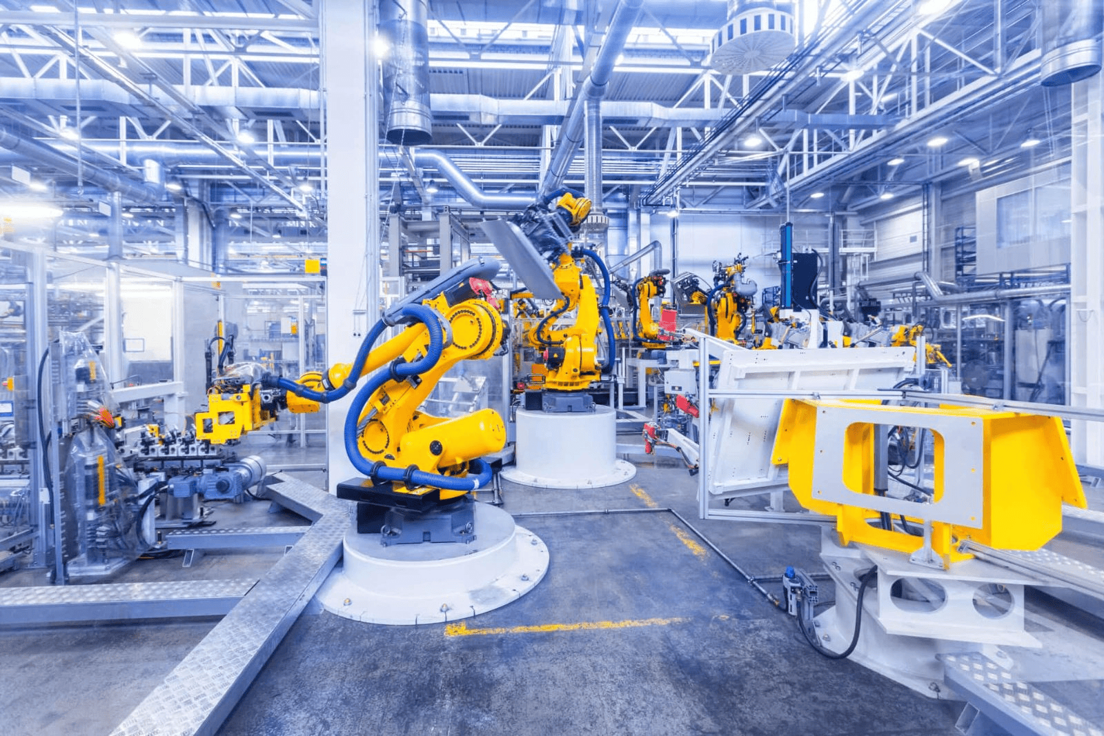 Robotic arms on a modern manufacturing line