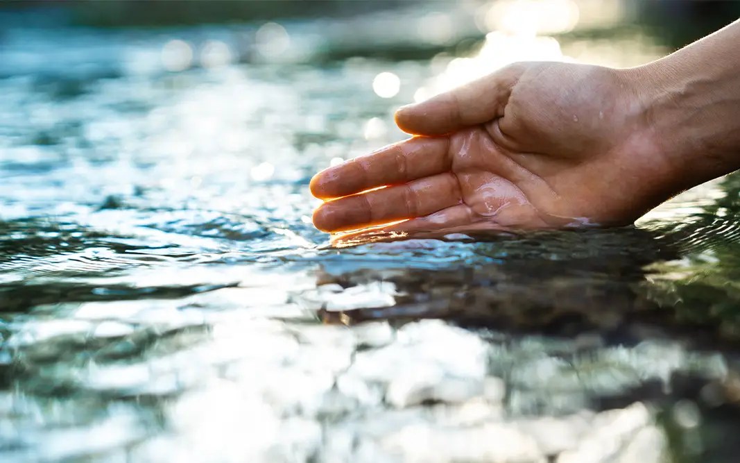 Hand in water