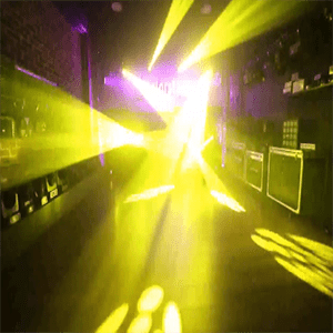 Intelligent moving head lights sweeping a wedding dance floor