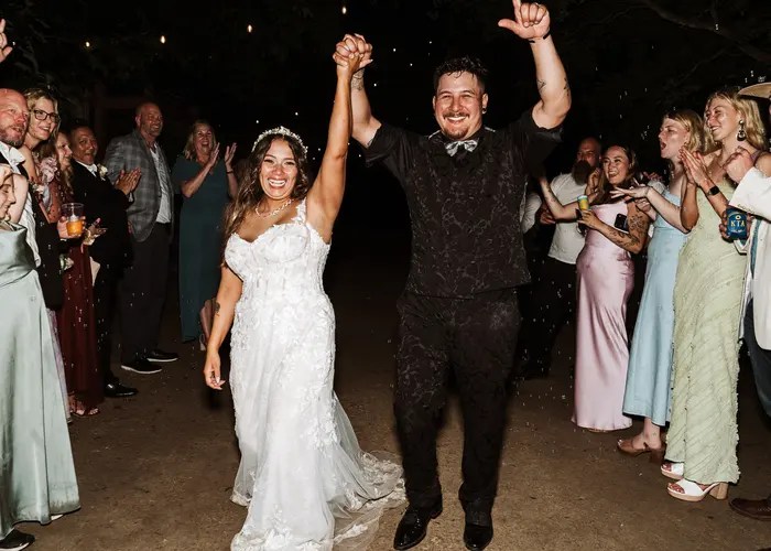 Candid wedding moment at Arrowwood Weddings + Events, Palmer, TX