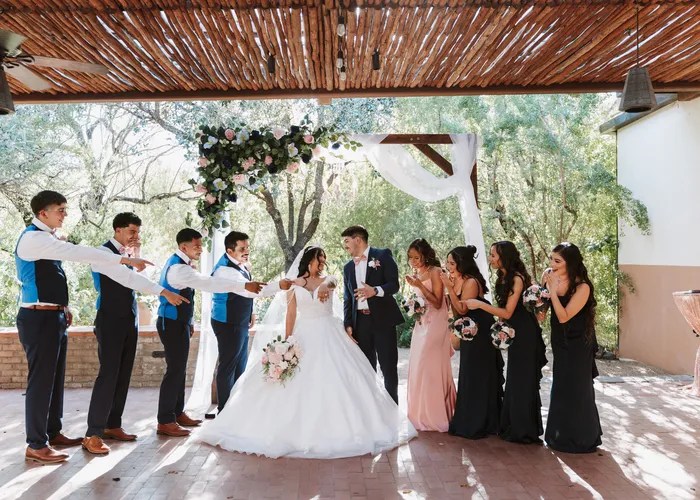 Candid wedding moment at Caesar Kleberg Wildlife Center, Kingsville, TX