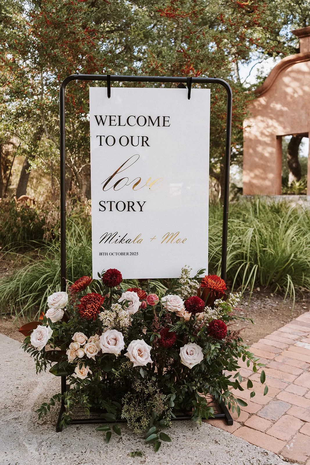 Mikala & Moe's outdoor ceremony setting at Camp Lucy, Dripping Springs, TX