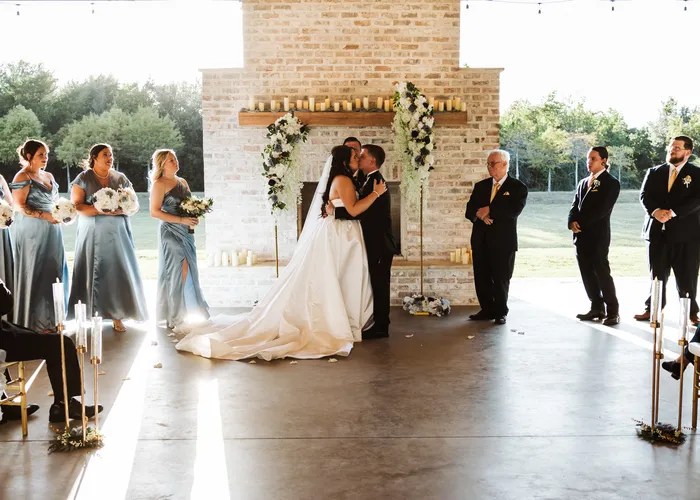 Candid wedding moment at Cedar Silos Event Venue, Baytown, TX