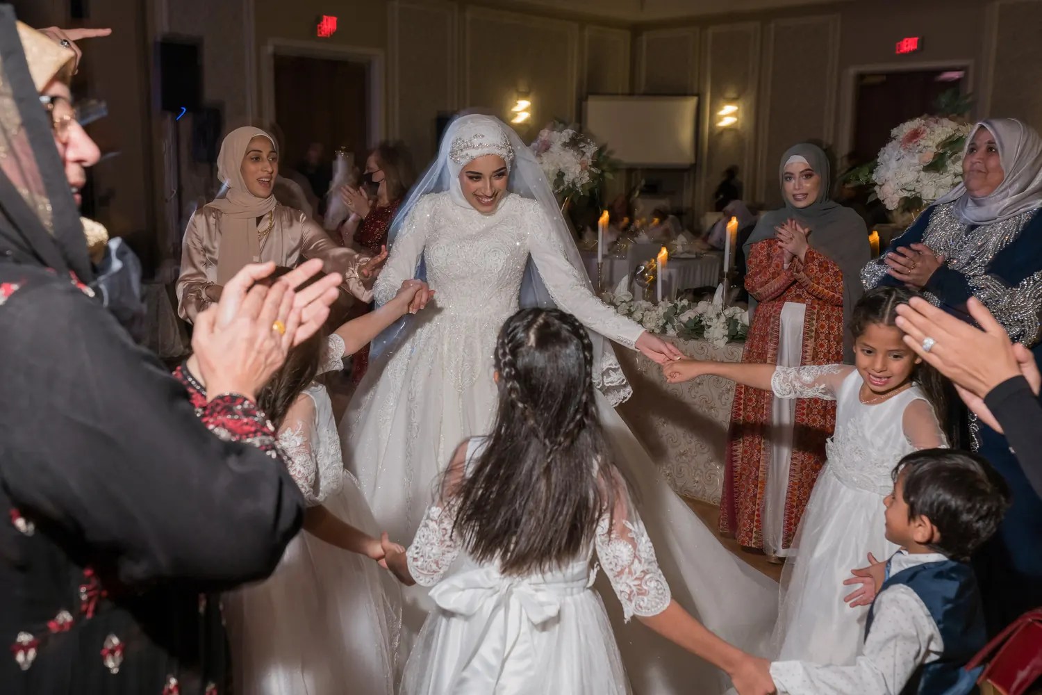 Desi bride dancing at her sangeet celebration, photographed by Weddings Unlimited