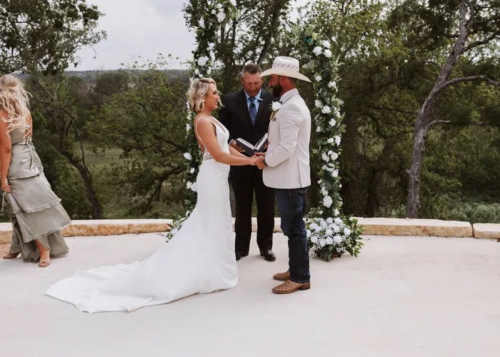 Candid wedding moment at Dos Palomas Ranch, Boerne, TX