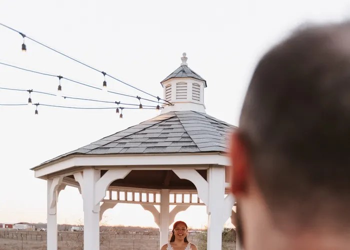 Candid wedding moment at Enchanted Ranch, San Marcos, TX