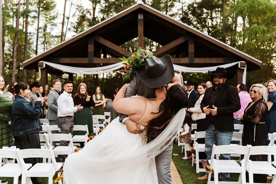 Outdoor wedding ceremony among the trees at Fountain View Farms, Splendora, TX