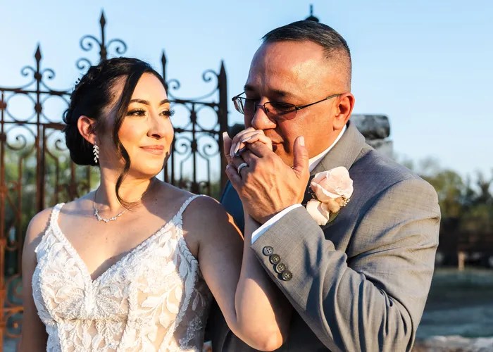 Candid wedding moment at Hofmann Ranch, Castroville, TX