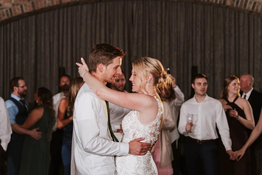 Guests dancing together at the reception at Iron Manor by Walters Wedding Estates, Texas