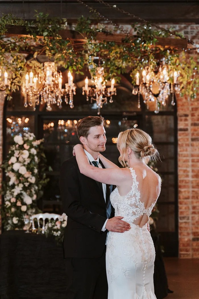 Bride and groom sharing their first dance at Iron Manor by Walters Wedding Estates, Texas