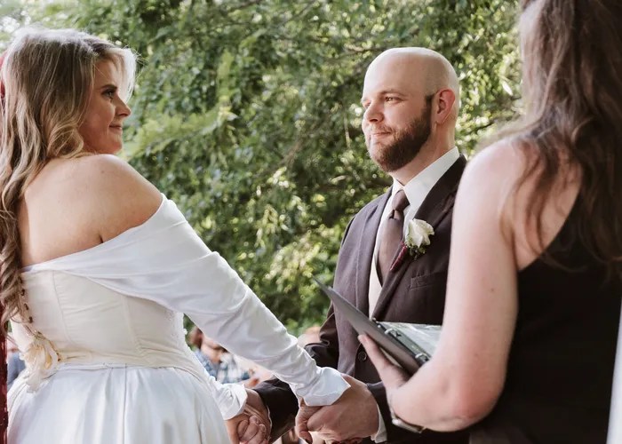 Candid wedding moment at La Cour Venue, McKinney, TX