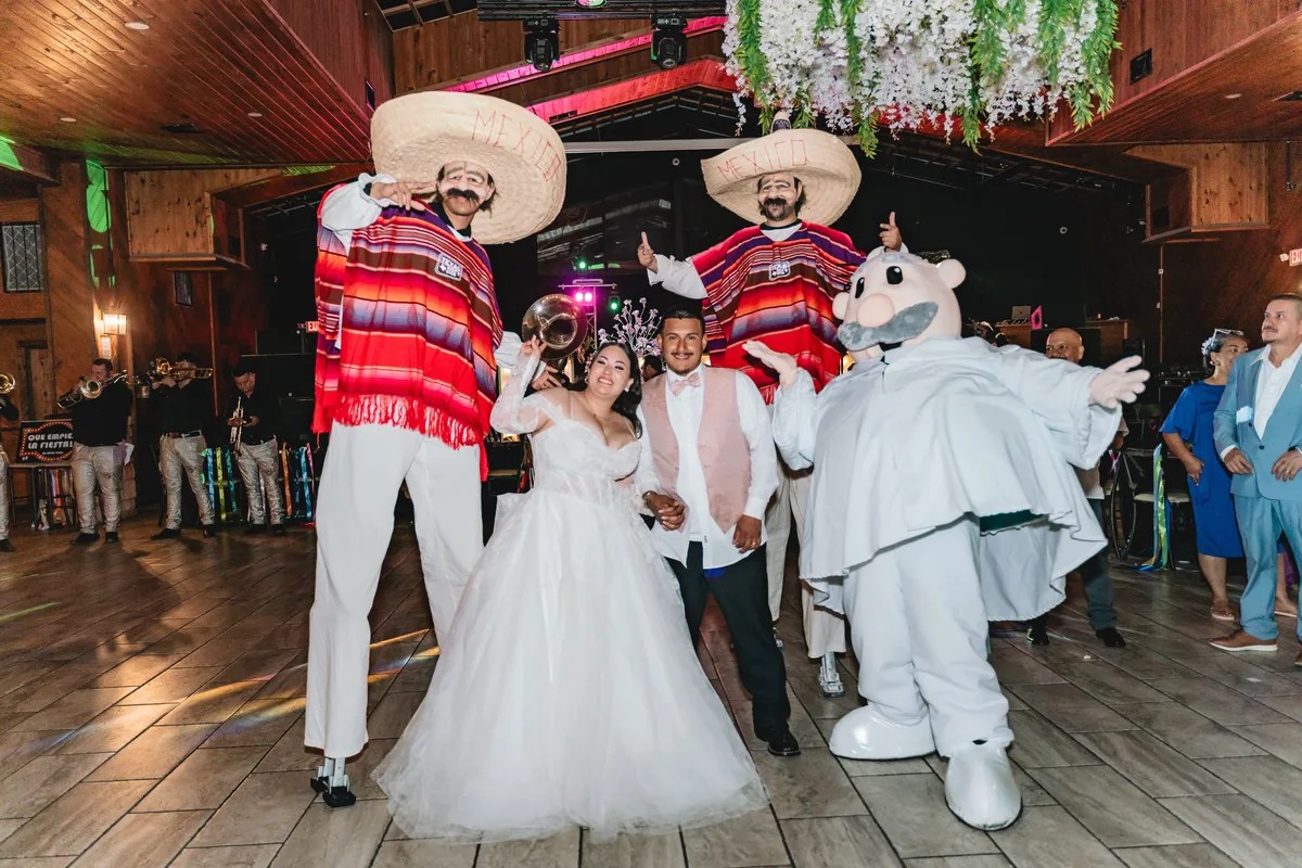 Latin wedding reception celebration photographed by Weddings Unlimited