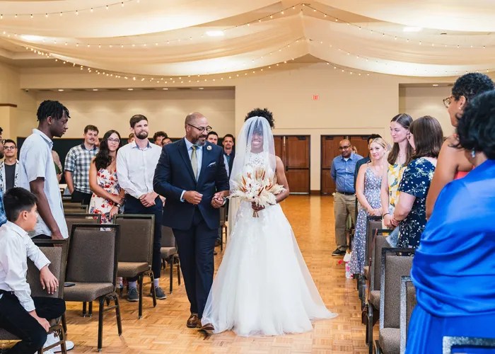 Candid wedding moment at New Braunfels Civic & Convention Center, New Braunfels, TX