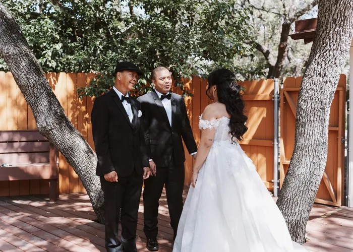 Candid wedding moment at Old San Francisco Steak House, San Antonio, TX