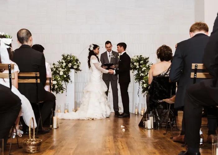 Wedding ceremony at One Eleven East, Hutto, TX