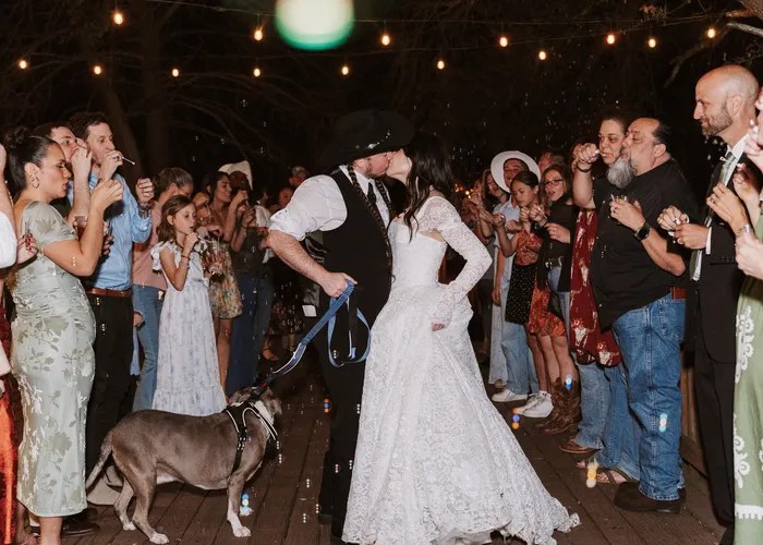 Candid wedding moment at The Orchard at Caney Creek, Wharton, TX