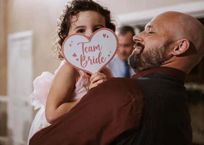 Candid wedding moment at Pecan Grove Plantation Country Club, Richmond, TX