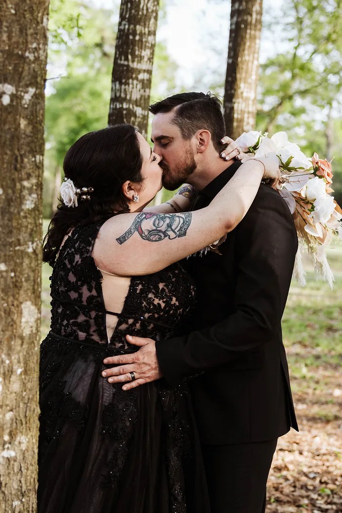 Bride and groom embracing at The Reserve on Cypress Creek, Cypress, TX