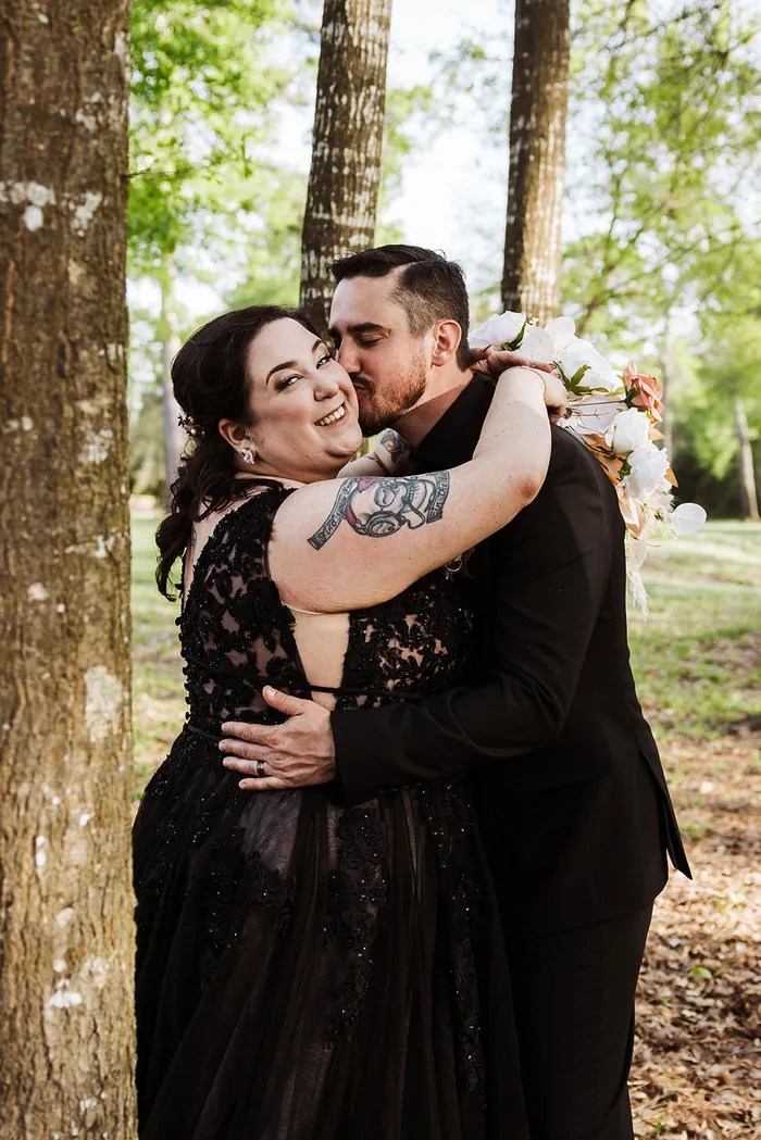 Newlyweds sharing an intimate moment at The Reserve on Cypress Creek, Cypress, TX