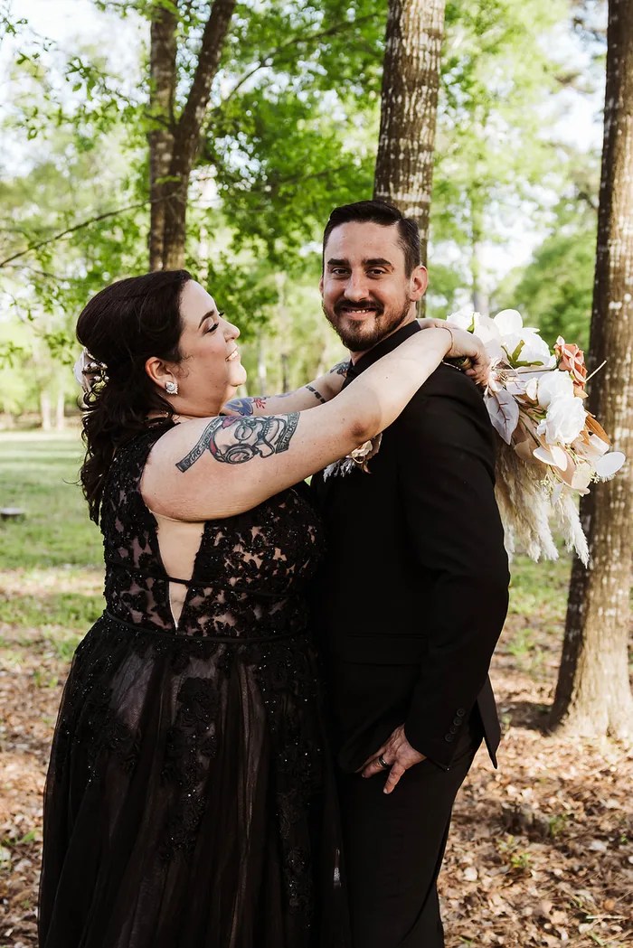 Bride and groom laughing together at The Reserve on Cypress Creek, Cypress, TX