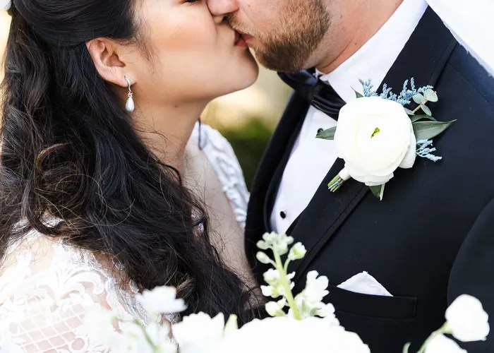 Candid wedding moment at St. John Vianney Catholic Church, Houston, TX