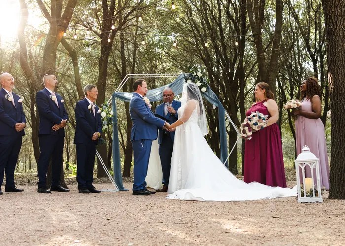 Candid wedding moment at A Thousand Oaks Events & Retreats, Cypress, TX