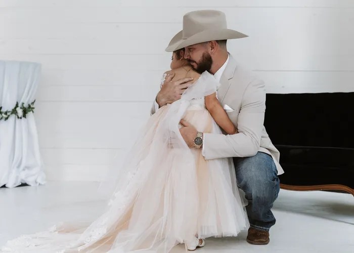 Candid wedding moment at Willowynn Barn, Santa Fe, TX