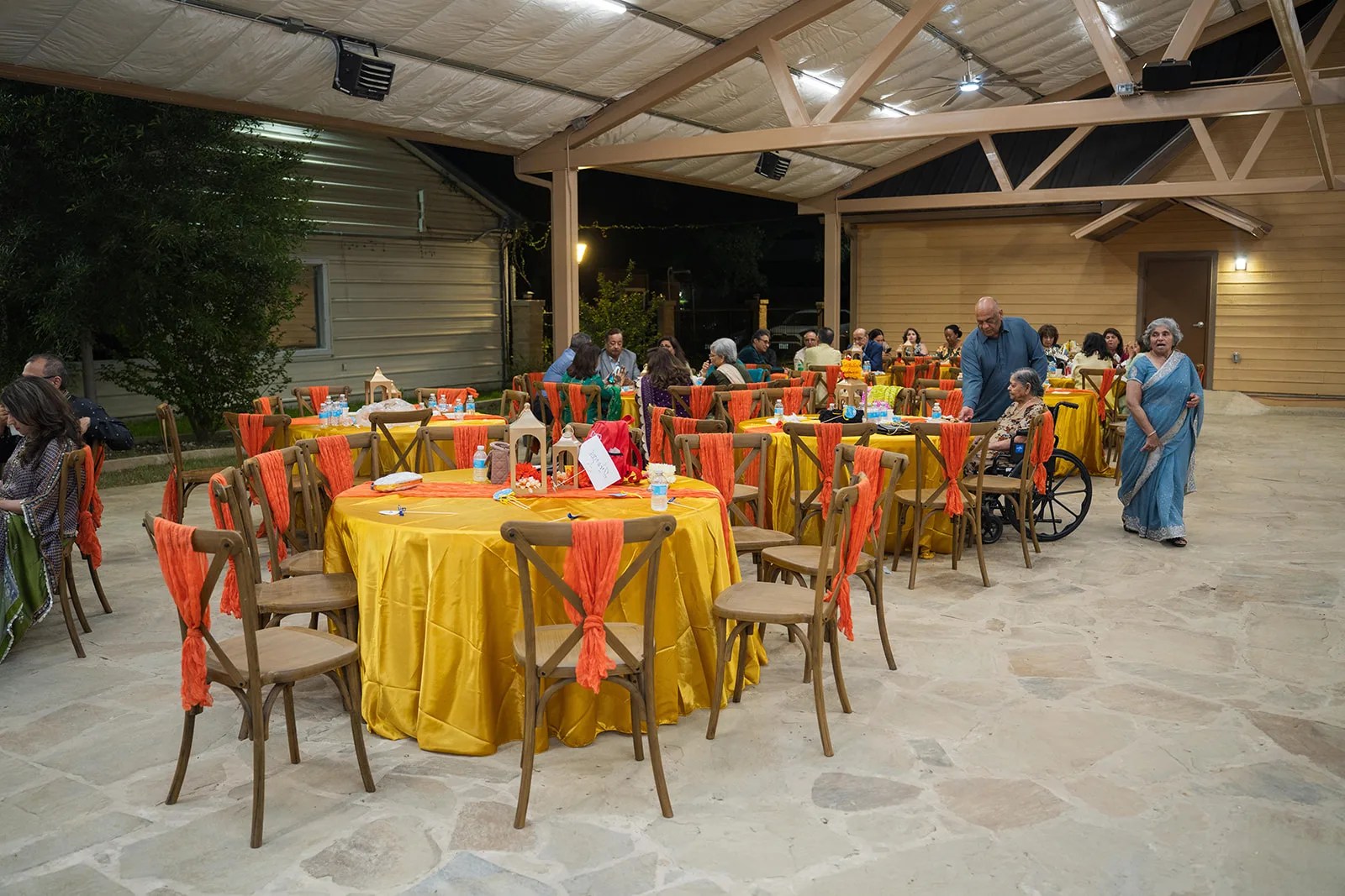 Banquet tables under the covered pavilion at A Charming Place at A Charming Place, San Antonio, TX