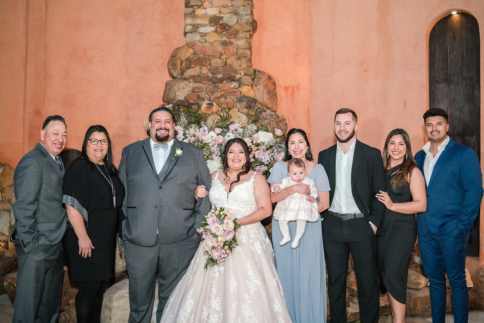 Family portraits under the hacienda arches at Agave Estates in Katy, TX