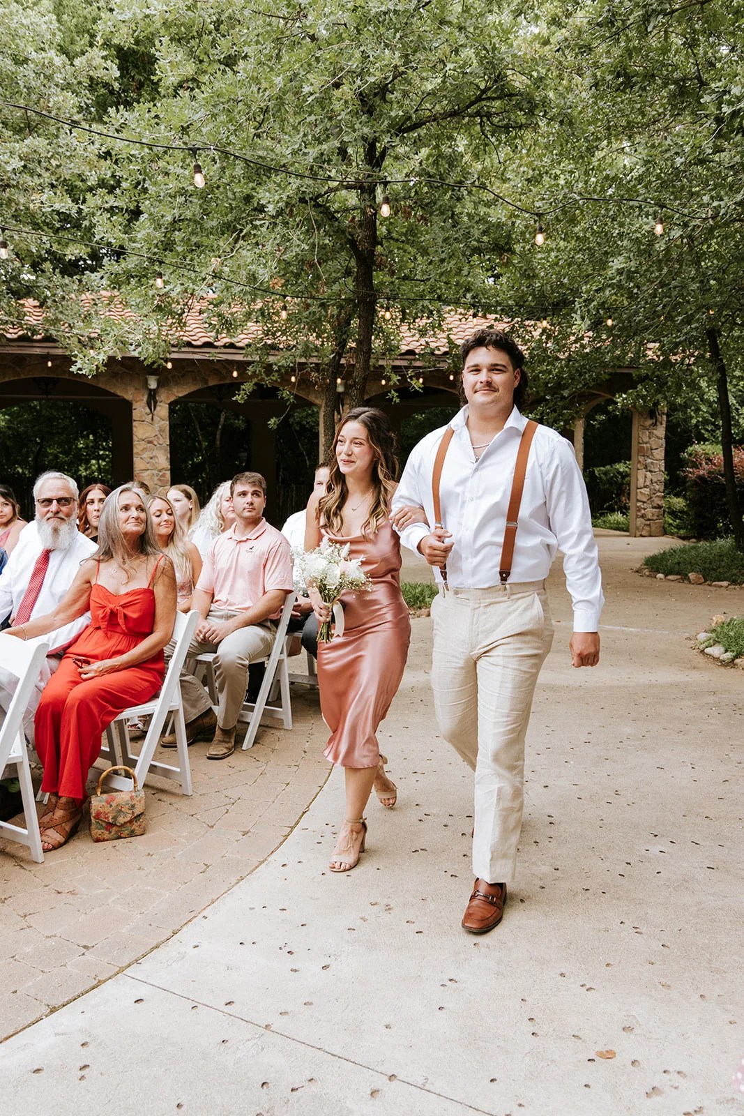 Outdoor wedding ceremony in the gardens at Aristide Mansfield in Mansfield, TX