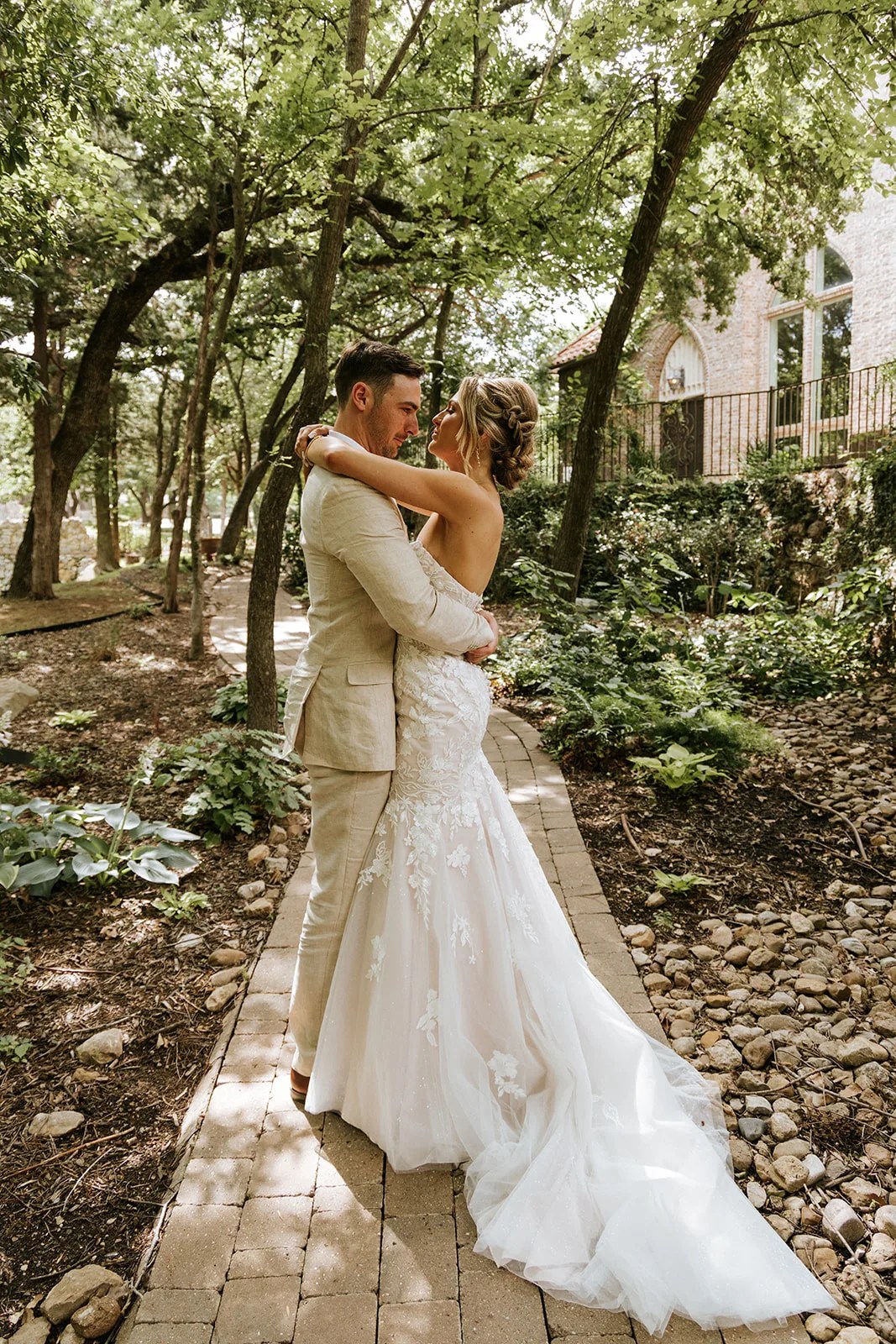 Bride in the gardens at Aristide Mansfield wedding venue in Mansfield, TX