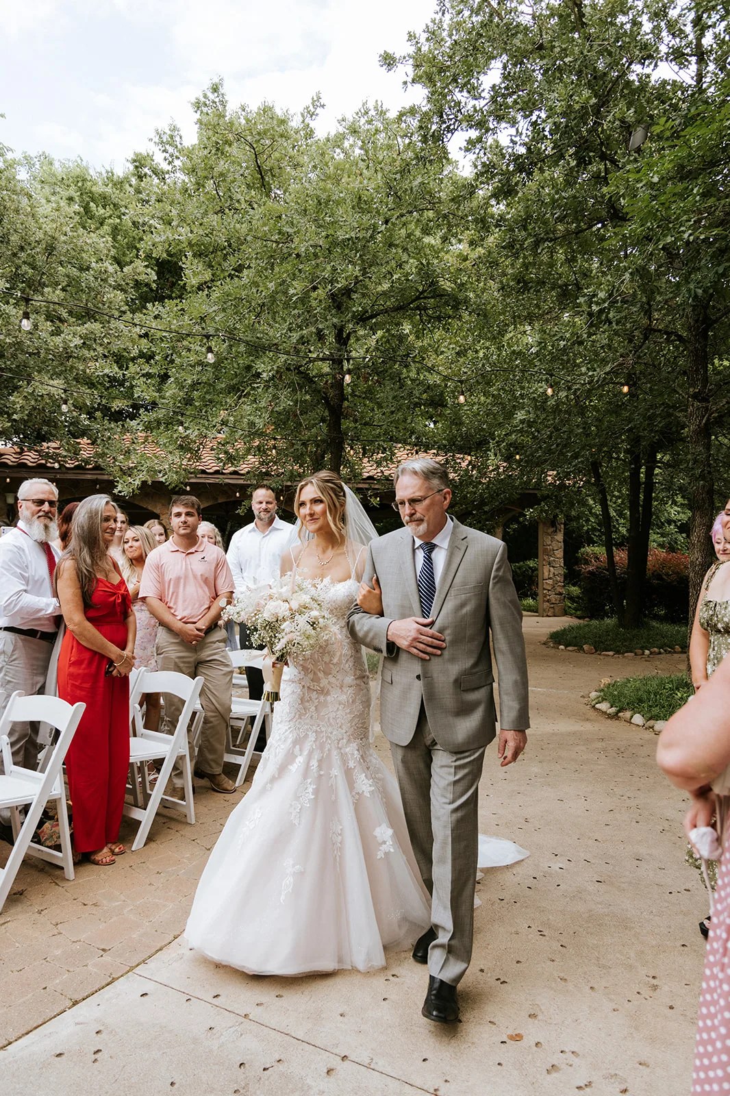 Bride and groom with guests at Aristide Mansfield in Mansfield, TX