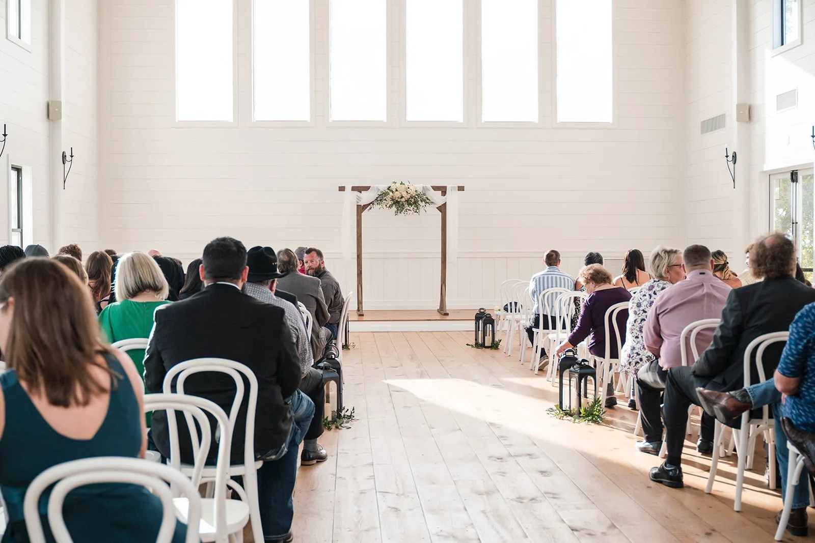 The ceremony aisle with guests seated at Arrowhead Hill, Montgomery, TX