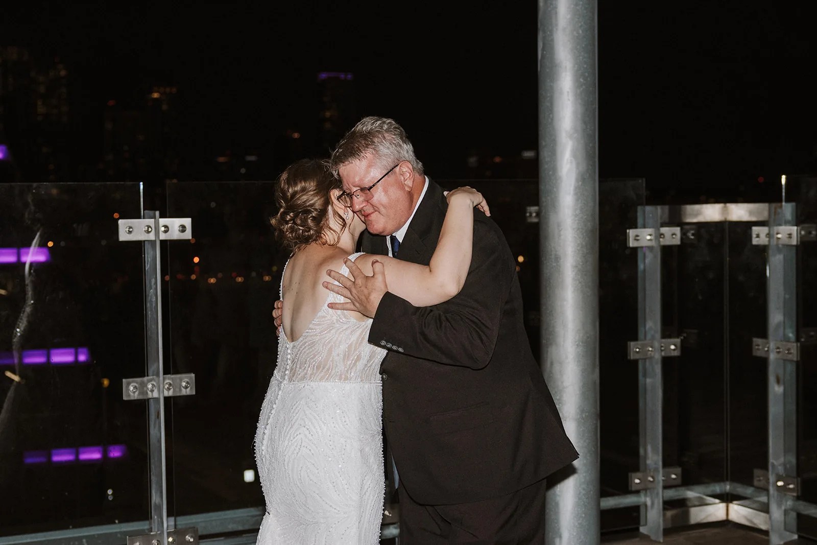 Dancing on the Roof Garden at night at the Austin Central Library in Austin, TX