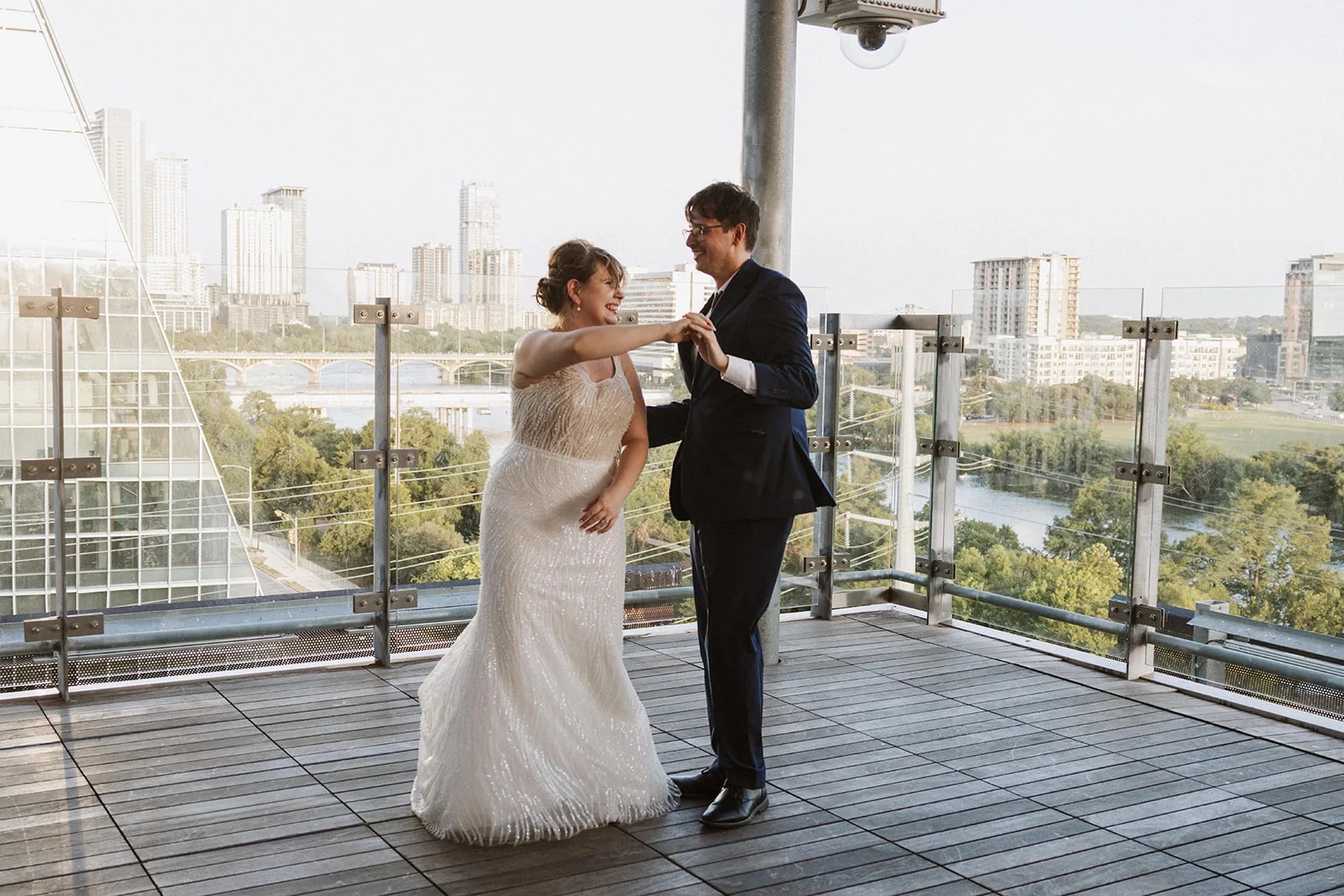 Newlyweds on the rooftop deck at the Austin Central Library in Austin, TX