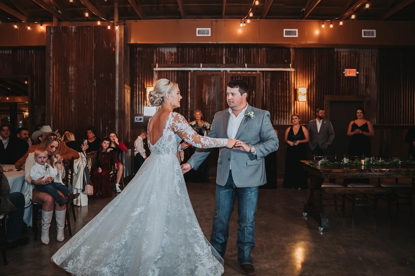 Bride in the reception hall at Beneath The Oaks in Midfield, TX