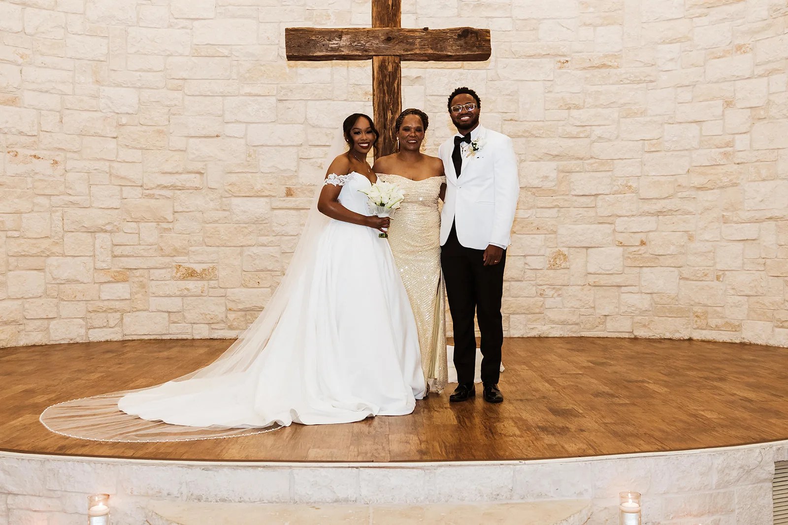 Couple at the limestone wall at Briscoe Manor, Richmond, TX