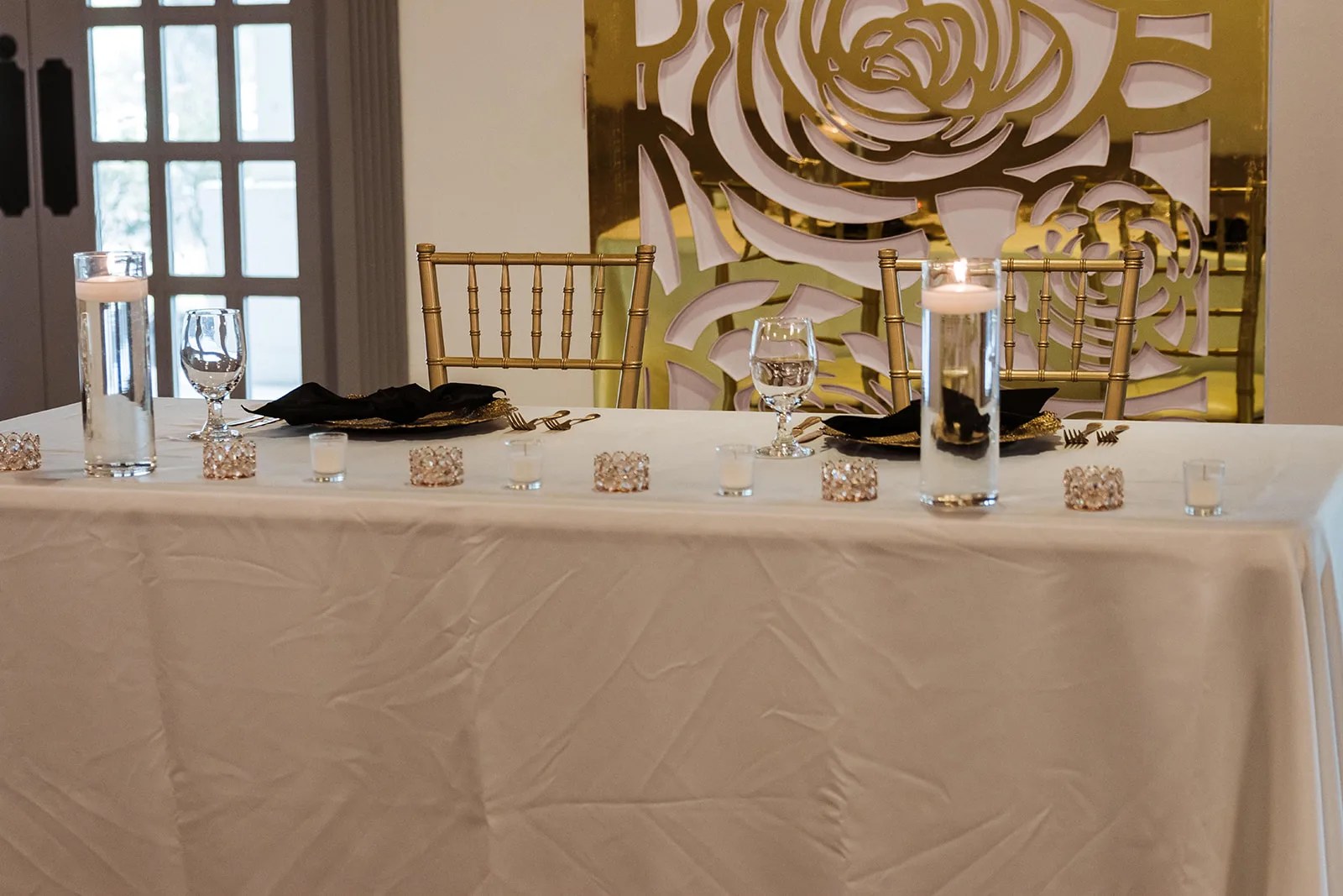 The head table in the ballroom at Briscoe Manor, Richmond, TX