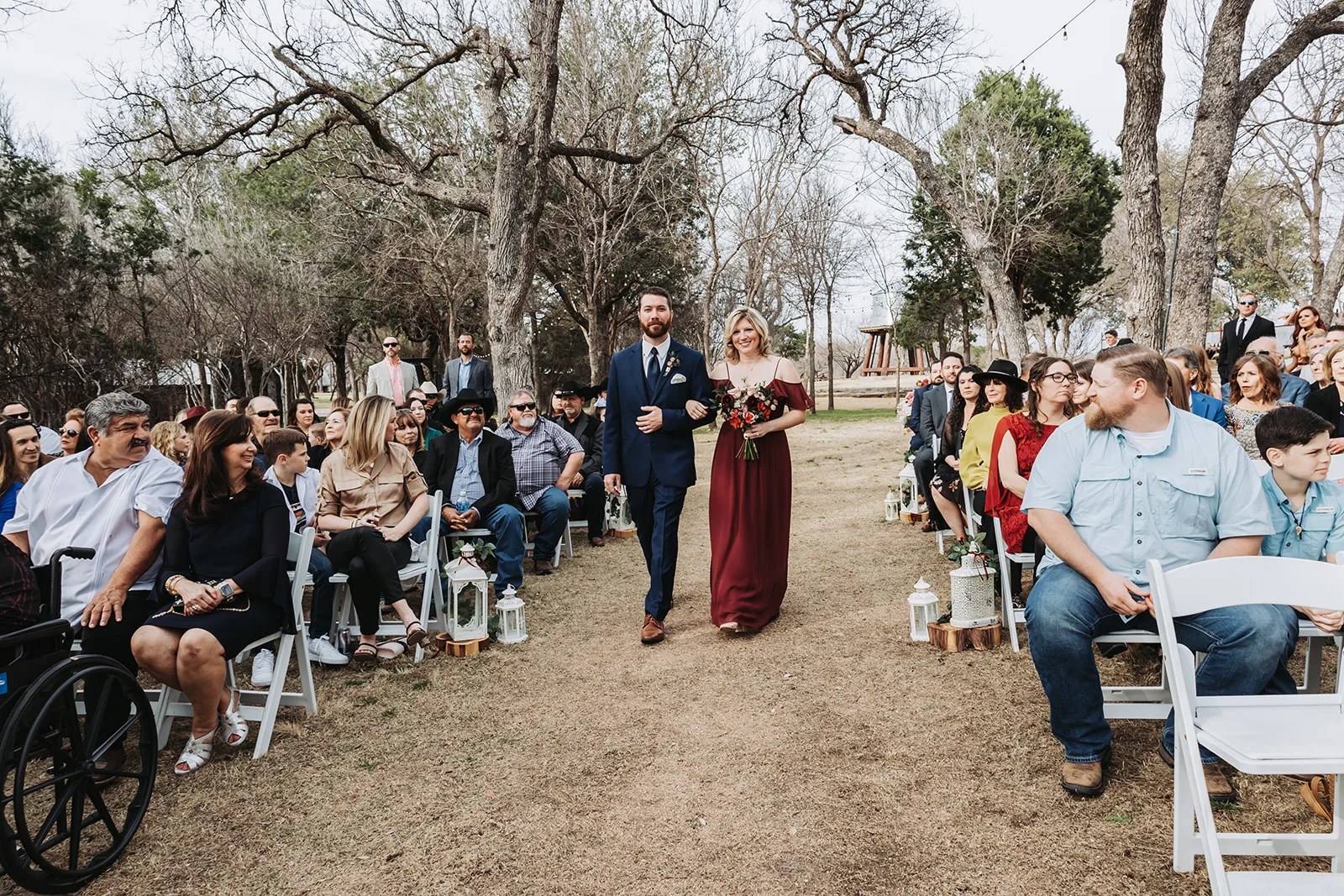Outdoor wedding ceremony among the trees at Cedar Skies in Burnet, TX