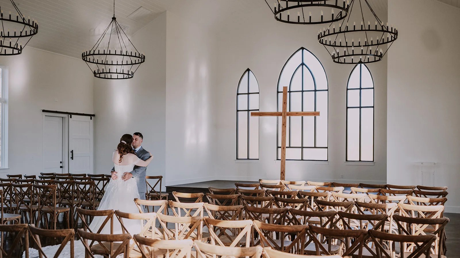 Chapel interior with arched windows at Deerfield Estates Venue at Deerfield Estates Venue, Waco, TX