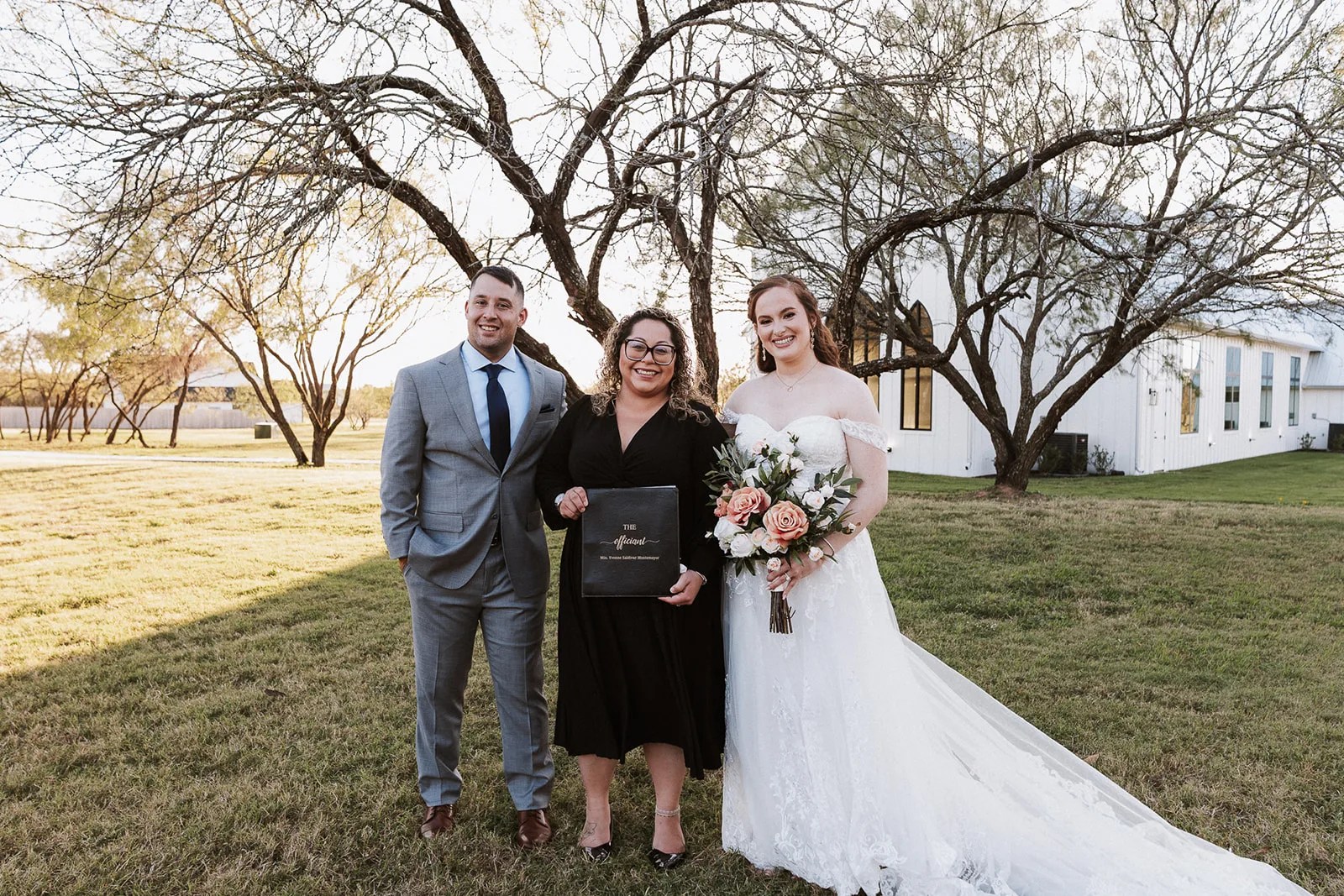 Bride and groom under the oaks at Deerfield Estates Venue at Deerfield Estates Venue, Waco, TX