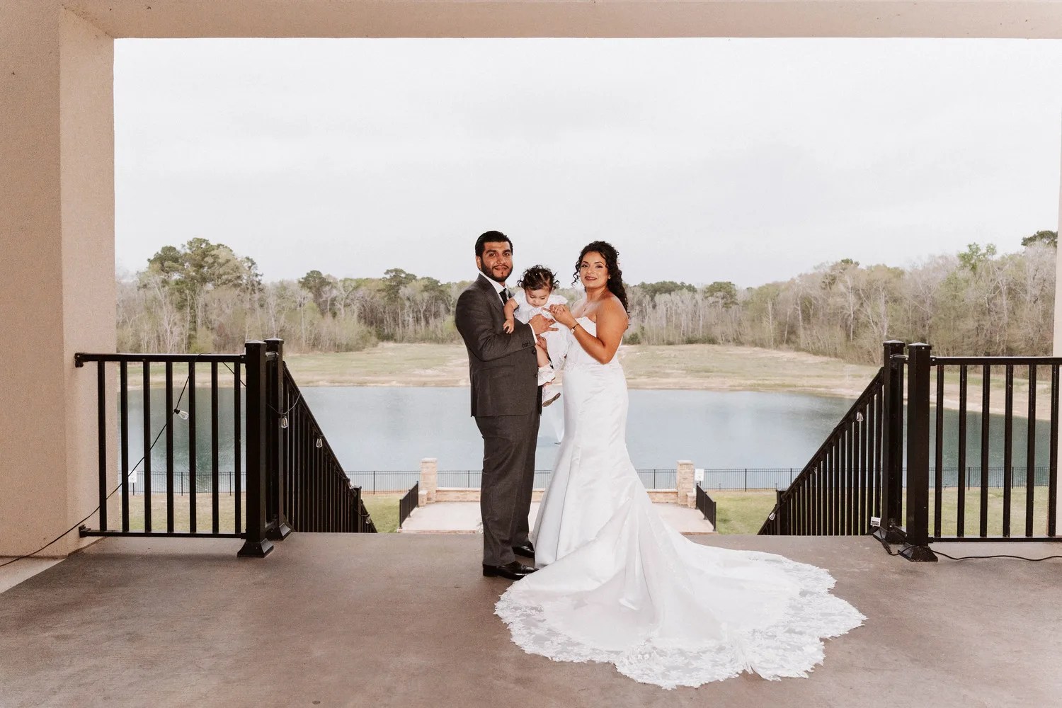 Couple on the lakeside deck at D'Gala Ranch, Crosby, TX