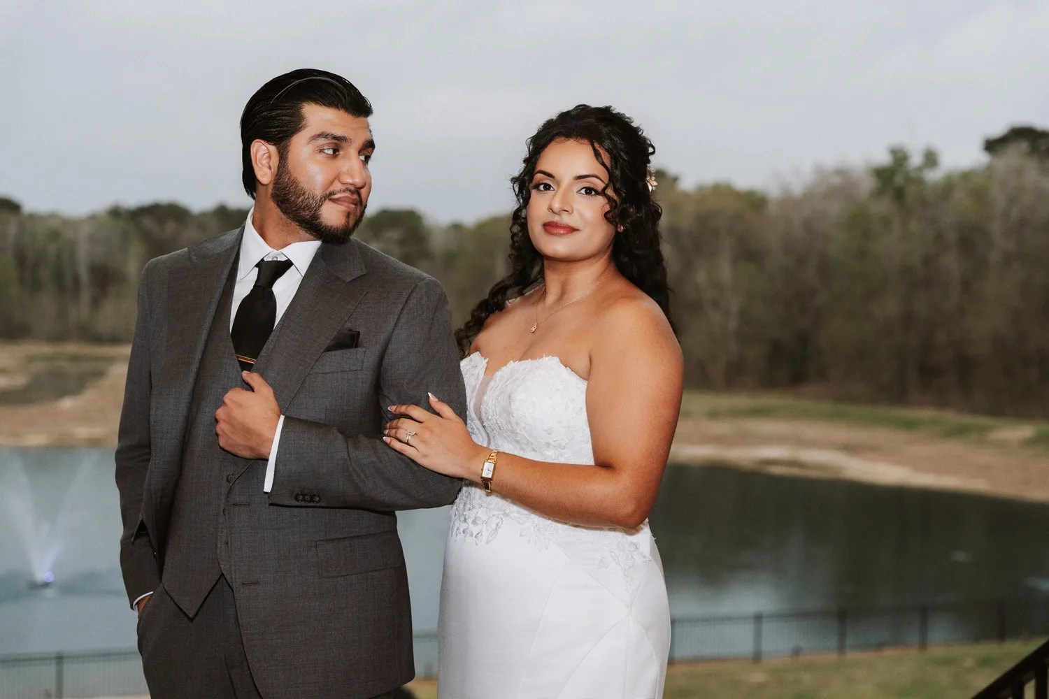 Bride and groom beside the lake at D'Gala Ranch, Crosby, TX