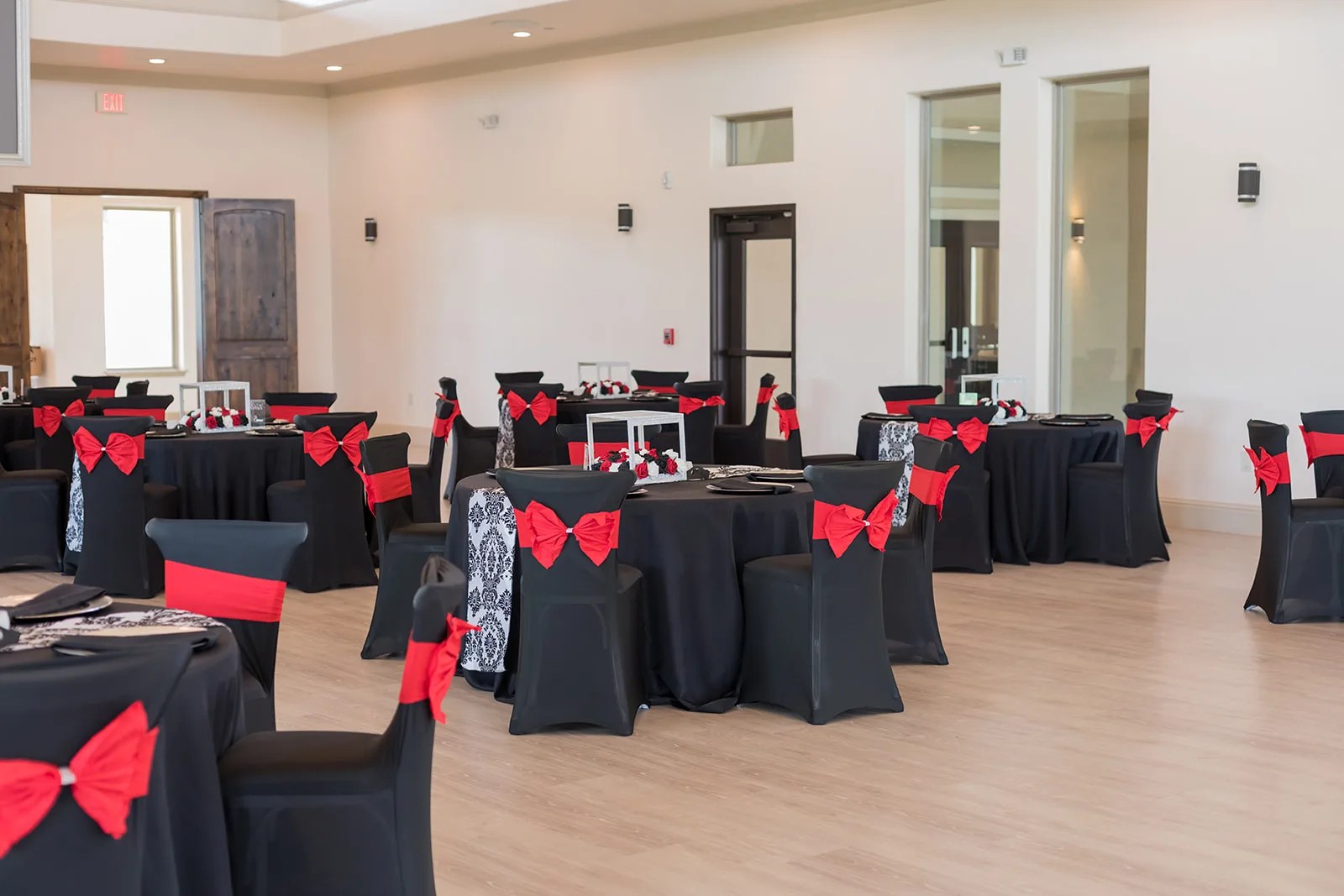 The ballroom set with round tables at D'Vine Grace Vineyard, McKinney, TX